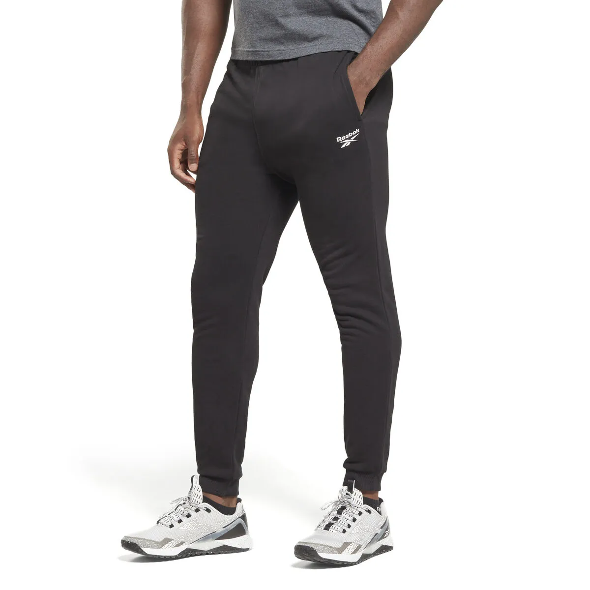 Pantalone per Adulti Reebok  LEFT LEG JOGG HS7376  Nero Uomo